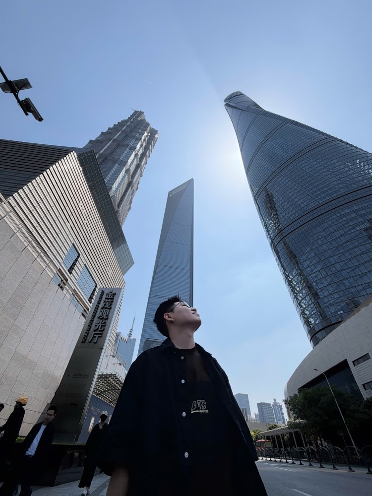 Hung Thinh Ho among city skyscrapers